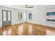 Bright living room featuring hardwood floors and multiple windows at 956 Glenwood Park Se Dr, Atlanta, GA 30316