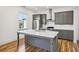 Modern kitchen with stainless steel appliances and an island at 956 Glenwood Park Se Dr, Atlanta, GA 30316