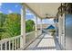 White-railed balcony overlooking lush green trees at 956 Glenwood Park Se Dr, Atlanta, GA 30316