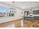 Open concept dining room with hardwood floors and kitchen view at 956 Glenwood Park Se Dr, Atlanta, GA 30316