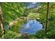 Peaceful pond with a central fountain, nestled in a garden setting at 956 Glenwood Park Se Dr, Atlanta, GA 30316