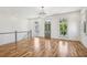 Spacious living room with hardwood floors and large windows at 956 Glenwood Park Se Dr, Atlanta, GA 30316
