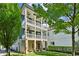 Three-story home with stone base and wrap-around porch at 956 Glenwood Park Se Dr, Atlanta, GA 30316