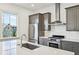Modern kitchen with stainless steel appliances and island at 956 Glenwood Park Se Dr, Atlanta, GA 30316