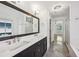 Elegant bathroom with double vanity, large mirror, and soaking tub at 956 Glenwood Park Se Dr, Atlanta, GA 30316