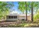 House with a screened porch and wooded backyard at 3215 Highway 20 Se, Conyers, GA 30013