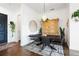 Bright dining area with a dark wood table and modern black chairs at 360 Chambers St # 151, Woodstock, GA 30188