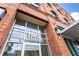 Exterior view of 360 Chambers building, highlighting its brick facade and modern entryway at 360 Chambers St # 151, Woodstock, GA 30188