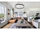 Spacious living room with leather sectional and statement art pieces at 360 Chambers St # 151, Woodstock, GA 30188