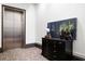 Building hallway with elevator and decorative console table at 360 Chambers St # 151, Woodstock, GA 30188