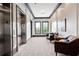 Building hallway with seating area and elevator access at 360 Chambers St # 151, Woodstock, GA 30188
