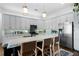 Modern kitchen with stainless steel appliances and large island at 360 Chambers St # 151, Woodstock, GA 30188