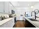 Modern kitchen with granite countertops and stainless steel appliances at 360 Chambers St # 151, Woodstock, GA 30188