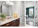 Vanity with granite countertop and a view of home office at 360 Chambers St # 151, Woodstock, GA 30188