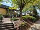 Outdoor patio seating area with umbrellas and heat lamps at 360 Chambers St # 151, Woodstock, GA 30188
