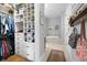 View of bathroom with closet, bathtub, and rug at 360 Chambers St # 151, Woodstock, GA 30188