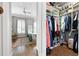 Large walk-in closet with ample shelving and hanging space at 360 Chambers St # 151, Woodstock, GA 30188