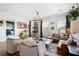 Bright living room with a leather sectional and large windows at 360 Chambers St # 151, Woodstock, GA 30188