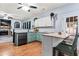 Eat-in kitchen features granite countertops, stainless steel appliances, and a breakfast bar at 1500 Terminal Ct, Mcdonough, GA 30252
