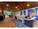 Extended covered patio includes seating and dining areas at 1500 Terminal Ct, Mcdonough, GA 30252