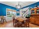Bright dining room with hardwood floors and charming wooden furniture at 1500 Terminal Ct, Mcdonough, GA 30252