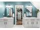 Spa-like bathroom with dual vanities and a large closet at 1500 Terminal Ct, Mcdonough, GA 30252