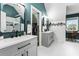 Modern bathroom with dual vanities and walk-in shower at 1500 Terminal Ct, Mcdonough, GA 30252