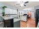 Modern kitchen with granite countertops, stainless steel appliances, and an island at 1500 Terminal Ct, Mcdonough, GA 30252