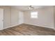 Spacious bedroom with hardwood floors and exterior access at 3814 N Camp Creek Sw Pkwy, Atlanta, GA 30331
