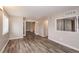 Open living room with hardwood floors and access to other rooms at 3814 N Camp Creek Sw Pkwy, Atlanta, GA 30331