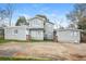 Two-story house with light gray siding and large backyard at 3814 N Camp Creek Sw Pkwy, Atlanta, GA 30331