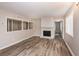 Spacious living room with hardwood floors and a fireplace at 3814 N Camp Creek Sw Pkwy, Atlanta, GA 30331