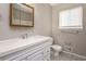 Clean bathroom with white vanity and tiled floor at 3814 N Camp Creek Sw Pkwy, Atlanta, GA 30331