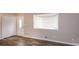 Living room with hardwood floors and bay window at 3814 N Camp Creek Sw Pkwy, Atlanta, GA 30331