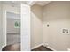 Small laundry room with vinyl flooring and washer/dryer hookups at 4649 Big Valley Ct, Stone Mountain, GA 30083