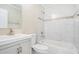 Updated bathroom with a bathtub, shower, and marble tile at 4649 Big Valley Ct, Stone Mountain, GA 30083