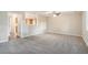 Spacious living room featuring neutral walls and carpeting at 4649 Big Valley Ct, Stone Mountain, GA 30083