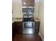 Stainless steel appliances and granite countertops highlight this updated kitchen at 20 Marietta St # 9F, Atlanta, GA 30303