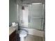 Bathroom with shower/tub combo and subway tile at 20 Marietta St # 9F, Atlanta, GA 30303