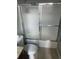 Bathroom with shower/tub combo and updated flooring at 20 Marietta St # 9F, Atlanta, GA 30303