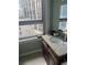 Bathroom with granite vanity and city view at 20 Marietta St # 9F, Atlanta, GA 30303