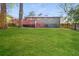 Large backyard with a deck and grassy area at 1868 Longdale Dr, Decatur, GA 30032