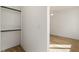 Open closet with wooden floors and hanging rod at 183 Moreland Se Ave # 107, Atlanta, GA 30316