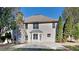 Two-story house with a large backyard patio at 12497 Lakeside Pkwy, Fayetteville, GA 30215