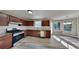 Modern kitchen with stainless steel appliances and granite counters at 12497 Lakeside Pkwy, Fayetteville, GA 30215