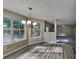 Bright dining area with hardwood floors and large windows at 12497 Lakeside Pkwy, Fayetteville, GA 30215