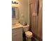 Bathroom with shower/tub combo and white vanity at 6503 Jackie Ln, Austell, GA 30106