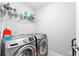 Convenient laundry room with washer and dryer at 140 Discovery Lake Dr, Fayetteville, GA 30215