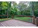 Wooden deck overlooking a wooded backyard at 116 Southside Dr, Villa Rica, GA 30180