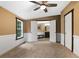 Main bedroom with carpet, ceiling fan and en-suite bathroom at 116 Southside Dr, Villa Rica, GA 30180